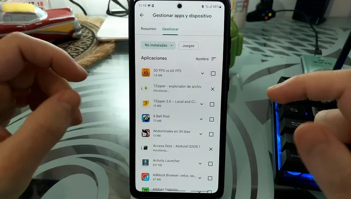 Haz clic en el icono de descarga para reinstalar.