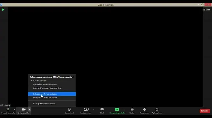 Presionar la flecha en el icono de la cámara y seleccionar "Seleccionar fondo virtual".