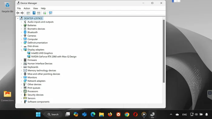 Expande "Adaptadores de pantalla" y encuentra tu tarjeta gráfica AMD.