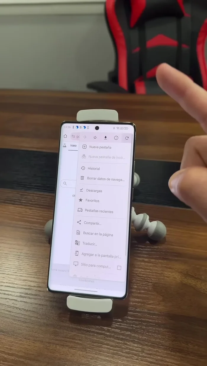Desliza hacia abajo nuevamente y busca "Configuración de sitios".