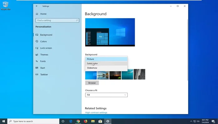 En la sección 'Colores', seleccionar un mosaico de fondo diferente en el menú desplegable. Probar con una imagen o un color sólido en lugar de la opción de presentación de diapositivas.