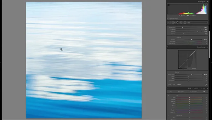 Ajustar los tonos HSL para oscurecer los azules, añadiendo profundidad.