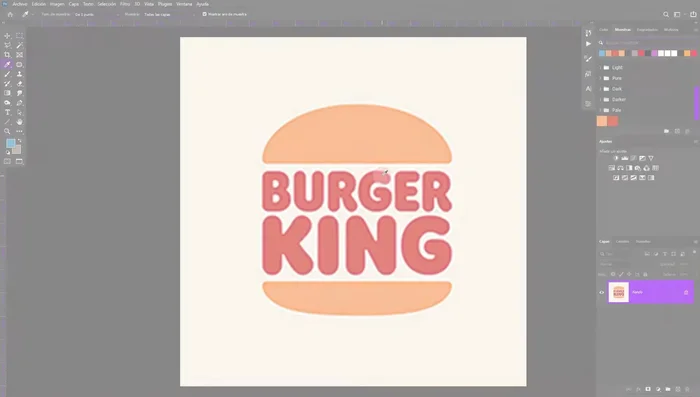 Desaturar el logo y convertir la capa en objeto inteligente.