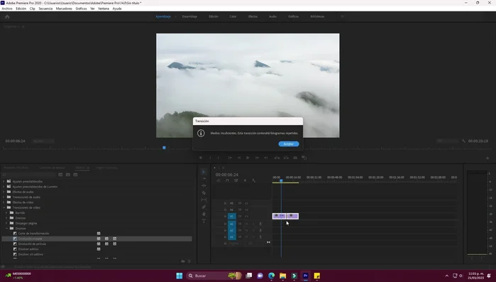 Arrastra la transición a la línea de tiempo entre los clips.