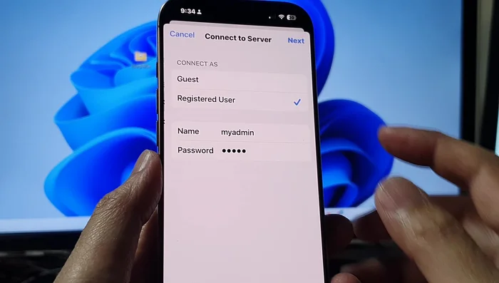 Conectar al servidor en el iPhone y tocar 'Siguiente'.